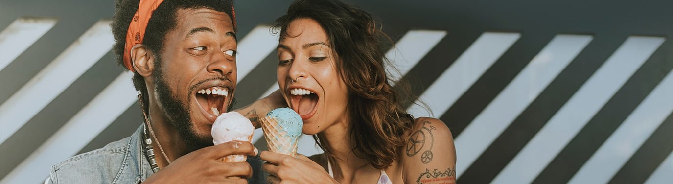 Male and female eating ice creams - dating advice on staying safe when on a date