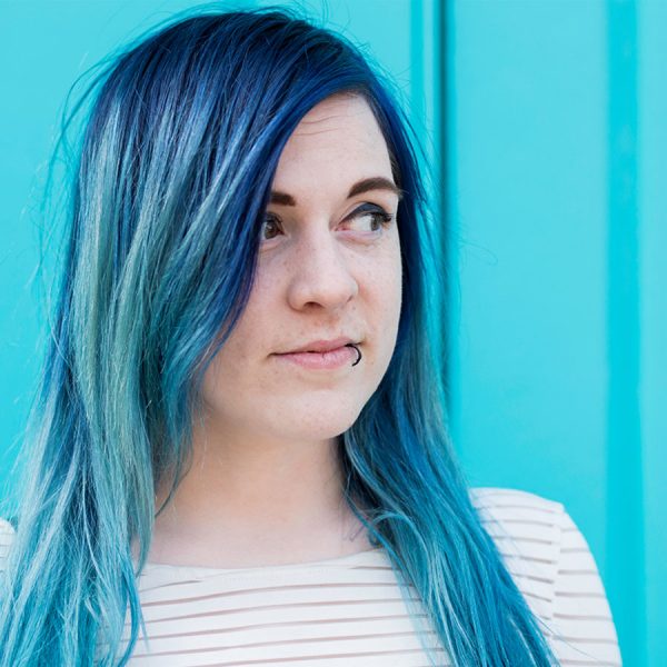 Woman with bright blue hair