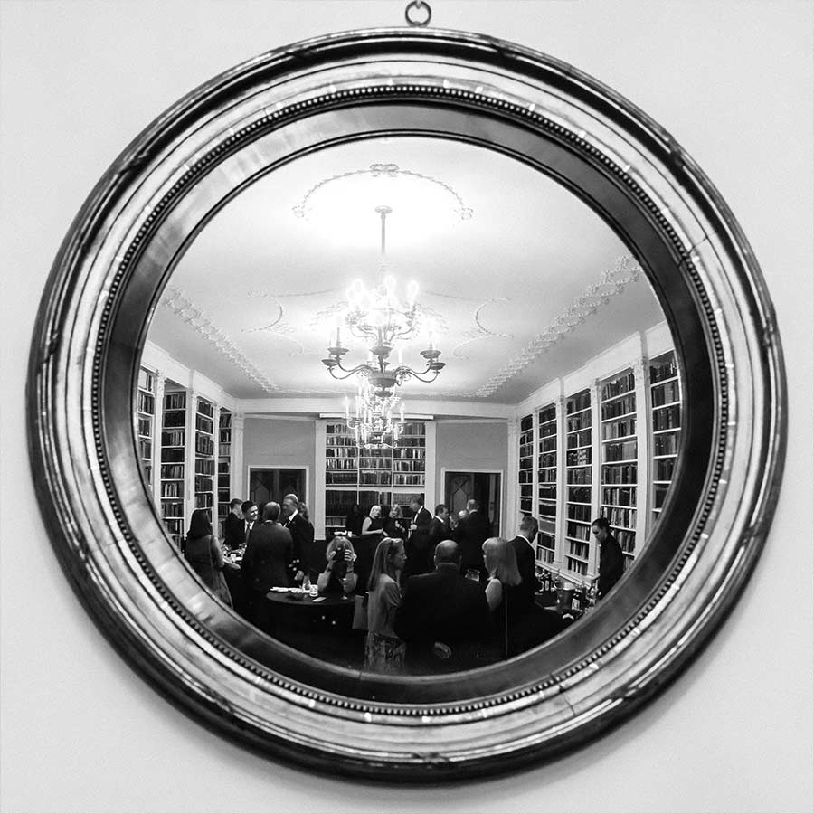 Reflection of event in a round mirror