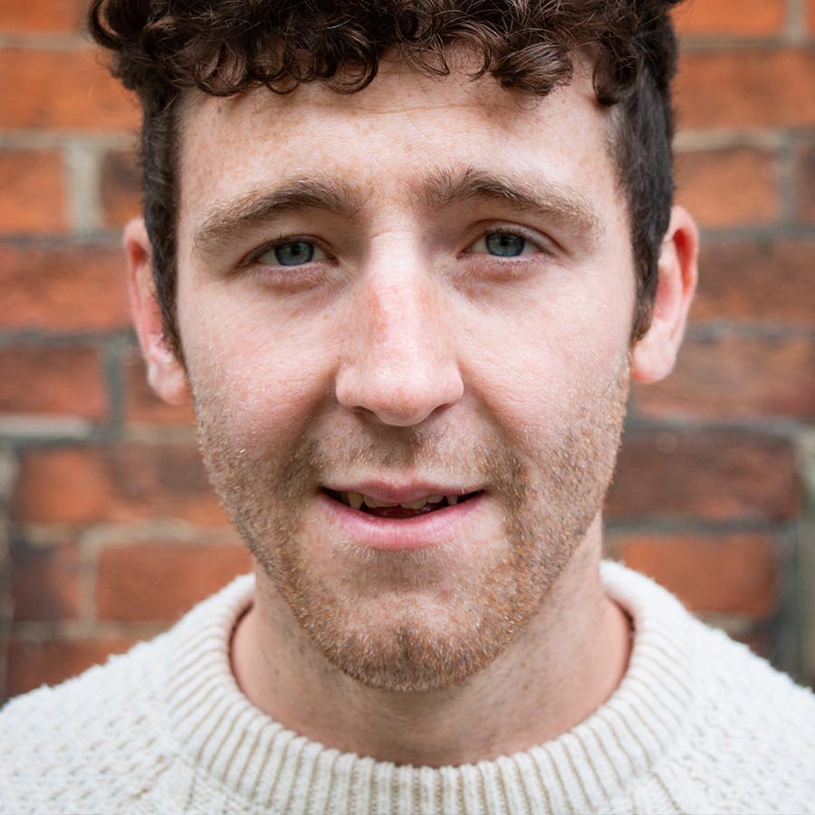 Dating photo of male in a knitted jumper